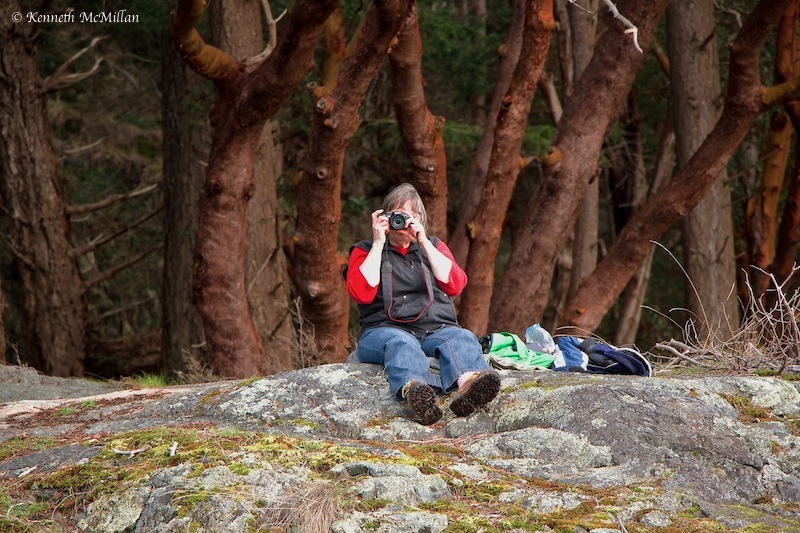 My wife (of 36+ years), best friend and budding photographer with a background of arbutus